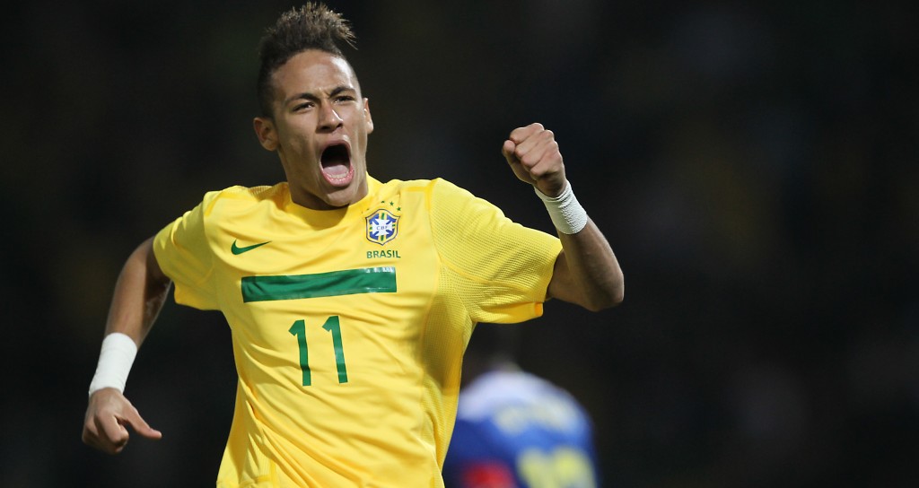 Neymar celebrates scoring a goal against Ecuador