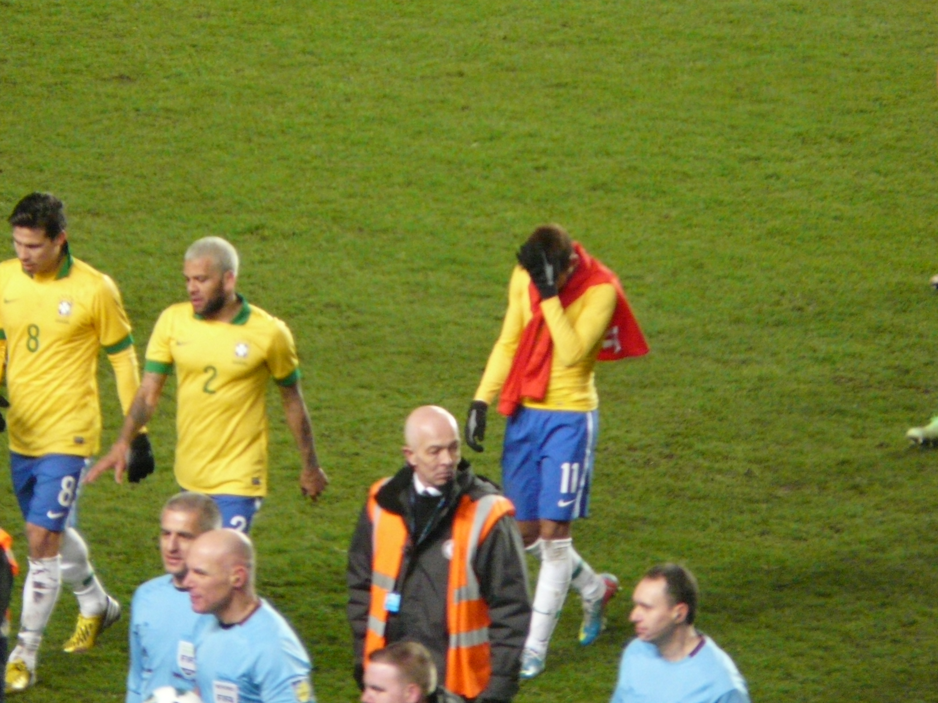 Head in hands, Neymar walks off the pitch